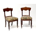 A set of six Victorian mahogany bar back dining chairs with scroll decoration,