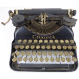 CORONA; a vintage black metal bodied typewriter.