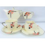 MIDWINTER; an Art Deco bachelor tea service comprising cup, saucer, side plate, teapot,