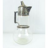 A 19th century claret jug with clear glass body and star cut base, with hallmarked silver lid,