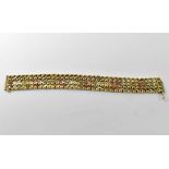 A 9ct three-colour gold woven bracelet with safety clasp, 2 x 19cm, approx 42.1g.