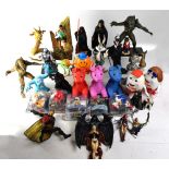 A quantity of loose and boxed toys, predominantly Sci-Fi characters,