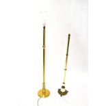 A brass-effect standard lamp with reeded column and marble-style base,