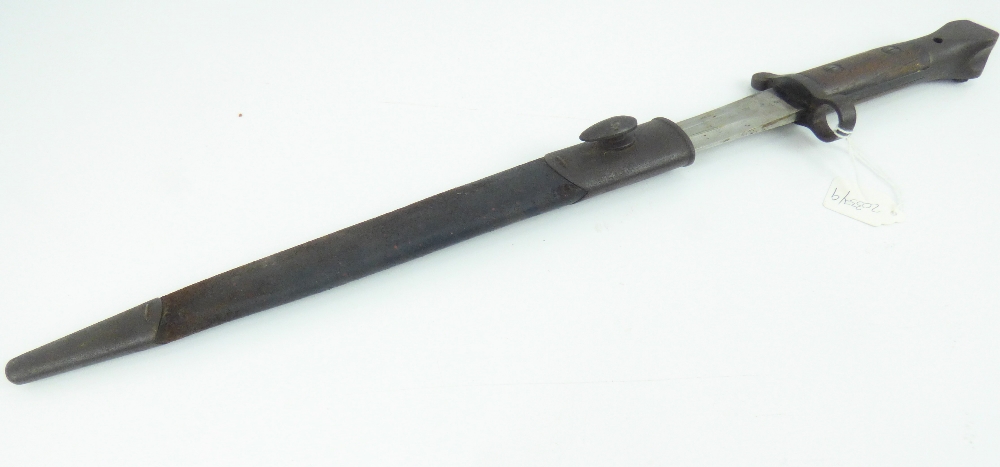 A German Model 1884 knife bayonet, marked 'J A Henckels', in steel scabbard, blade length 24.5cm.