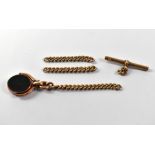 Various broken pieces of 9ct rose gold jewellery, comprising a T-bar, two chain sections,