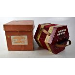 A Bandmaster concertina No.55 with twenty keys, in original box.