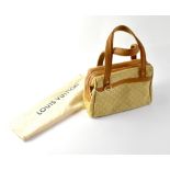 LOUIS VUITTON; a sand canvas bag with lighter sand Louis Vuitton logo, tan fabric and leather trim,
