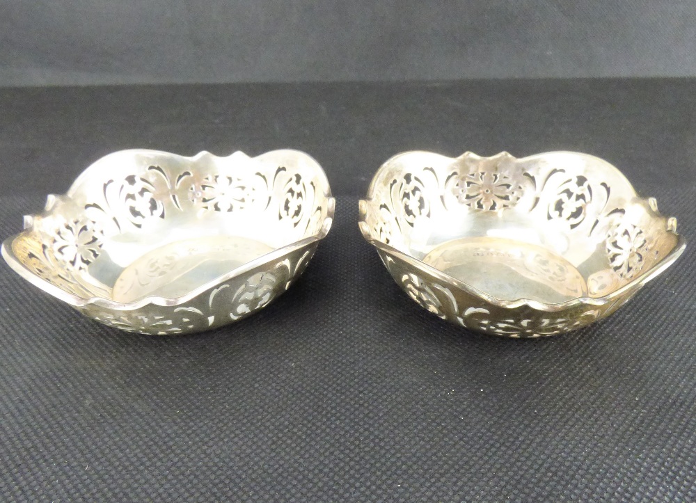 A pair of George VI hallmarked silver pierced dishes, diameter 7.