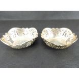 A pair of George VI hallmarked silver pierced dishes, diameter 7.