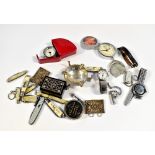 A quantity of wristwatches, penknives, fruit knives, a nurse's belt buckle,