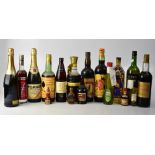 A bottle of Pommia Sparkling Cider, a Carlos III Solera Reserva Spanish wine,