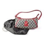 GUCCI; a grey canvas bag with blue Gucci logo, red leather trim and white metal Gucci logo hardware,