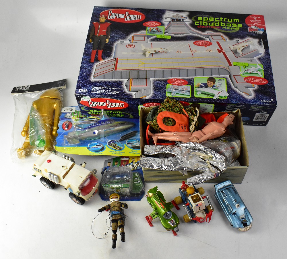 A collection of space-related toys comprising a 'Captain Scarlet Spectrum Cloud Base Electronic