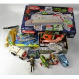 A collection of space-related toys comprising a 'Captain Scarlet Spectrum Cloud Base Electronic