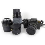 A Pentax SF7 camera and lens and three other lenses, a Sigma auto-focus zoom, F=75 300mm,