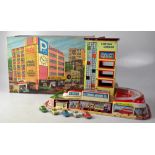 A vintage Technofix tinplate central garage no.321, in original box.