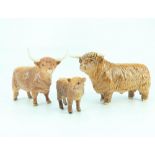 BESWICK; a family of Highland cattle comprising bull, heifer and calf (3).