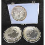 Two Queen Elizabeth II Britannia One Ounce Fine Silver coins, 2000 and 2002,