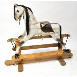 A rocking horse for restoration, 124 x 151 x 53cm.