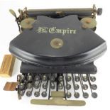 THE EMPIRE; a vintage black metal typewriter.