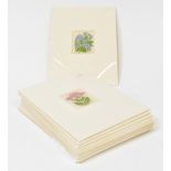 Thirteen small embroidered silk panels depicting various flowers, each 6 x 5cm,