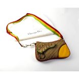 CHRISTIAN DIOR; a 'Rasta Line' canvas and multicoloured calfskin leather cross-body saddle bag,