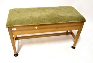 A 1940s walnut upholstered duet stool wi