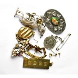 A quantity of jewellery to include a pewter brooch, etc.