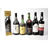 A bottle of W & J Graham's Qunita Dos Malvdos 1998 Port, a Warre's 1985 vintage port,