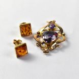 A pair of 9ct gold earrings with square bezel set amber studs and butterfly fasteners,