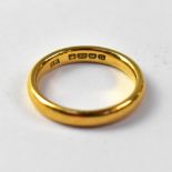 A 22ct gold wedding band, size L, approx 4.6g.