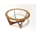 G PLAN; an Astro glass topped circular coffee table, diameter 83cm.