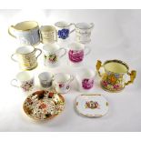 Twelve 19th and 20th century hand painted cups and loving cups to include Coalport,