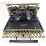 VARITYPER; a vintage 1930s American typewriter, together with a spare Tepe plate typeface, boxed.