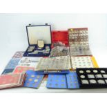 A large quantity of mixed coinage, mostly UK, to include decimal and pre-decimal examples,