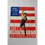 BRUCE SPRINGSTEEN; 'Born In The USA' tour programme, signed, with ticket stub (2).