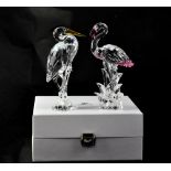 SWAROVSKI; a 'Feathered Beauties Series, Flamingo', height 16cm, together with a stork, height 15cm,