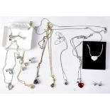 SWAROVSKI; various crystal pendant necklaces including a swan, a heart, red heart,