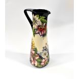 MOORCROFT; a trial piece slender jug, line decorated with fuchsias, lilies, sunflowers,