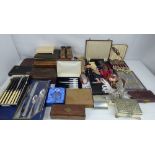 Various modern and vintage collectibles to include carved wooden boxes, various cutlery boxes,