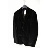 A black velvet evening jacket by Jaeger, size 38R.