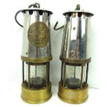 A near pair of miners' Davy lamps comprising a Type M.C.40 No.