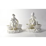 A pair of late 19th/early 20th century European blanc de chine figurines,