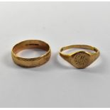 Two 9ct gold rings comprising a band with wavy edge design, size U,