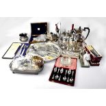 Various silver plated wares to include a three-piece glass decanter set on stand,