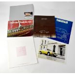 A selection of 1970s and 1980s car brochures, to include Porsche, Aston Martin and Daimler.