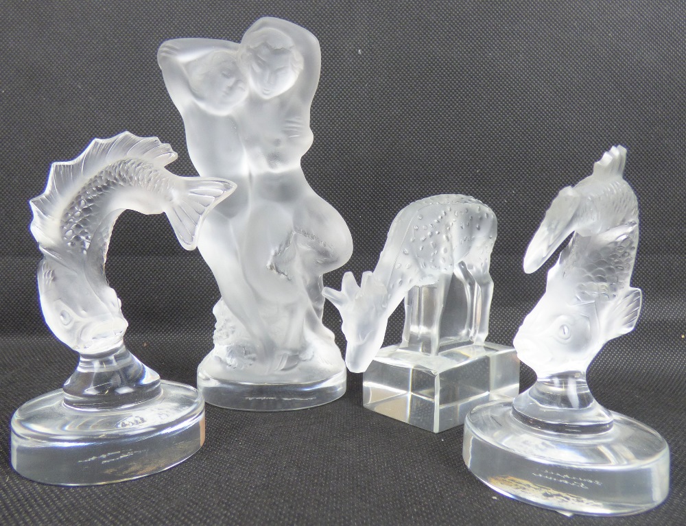 LALIQUE; four modern glass paperweight figures,