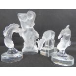 LALIQUE; four modern glass paperweight figures,