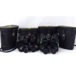 Three pairs of modern binoculars in travel cases (3).