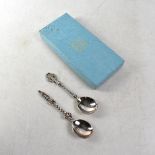 Two Elizabeth II hallmarked silver anointing-style spoons, one with twist stem and apostle finial,